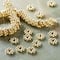 12 Pack: Gold Bump Metal Rondelle Beads, 8mm by Bead Landing™